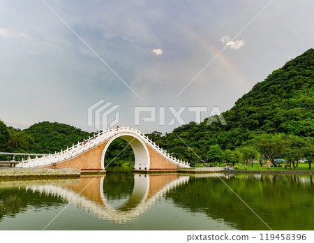 Beautiful landscape of the Moon Bridge at Dahu Park Beautiful landscape of the Moon Bridge at Dahu Park 119458396