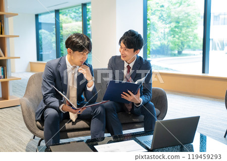 Two male businessmen having a meeting Two male businessmen having a meeting 119459293