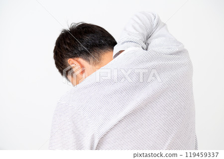 Middle-aged man suffering from dry skin 119459337