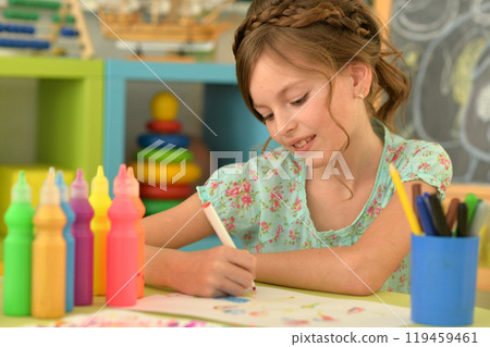 Portrait of cute girl drawing picture at home Portrait of cute girl drawing picture at home 119459461