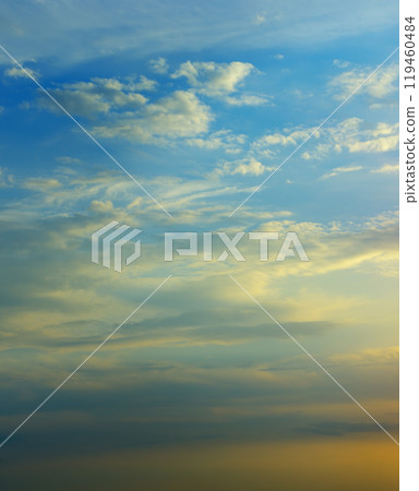 Sunrise sky with lighted clouds. Vertical photo. Sunrise sky with lighted clouds. Vertical photo. 119460484