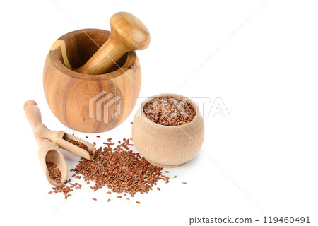 Flax seeds, wooden pestle and mortar isolated on white. Collage. Free space for text. Flax seeds, wooden pestle and mortar isolated on white. Collage. Free space for text. 119460491