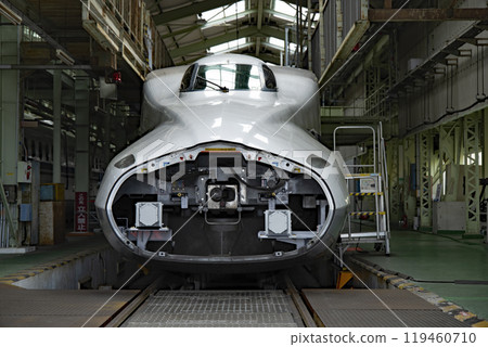 Shinkansen with the coupler cover open 119460710