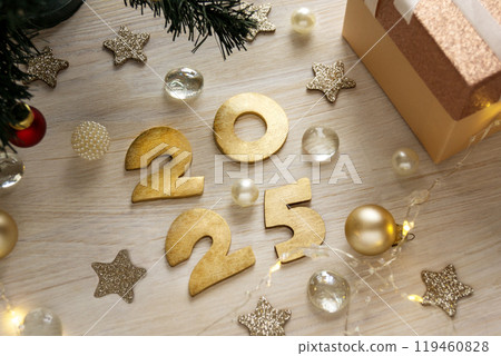 Festive background wit numbers 2025 Christmas tree gift. Greeting card or banner for New Year holidays. Festive background wit numbers 2025 Christmas tree gift. Greeting card or banner for New Year holidays. 119460828