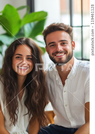 Warm Smiles from Colleagues in a Bright Office 119461128