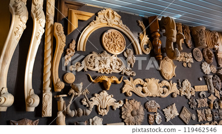 carving element. furniture in classic style. white color wood with gold trim. patina. carving. small depth of field. luxury furniture. use as background. carving element. furniture in classic style. white color wood with gold trim. patina. carving. small depth of field. luxury furniture. use as background. 119462546