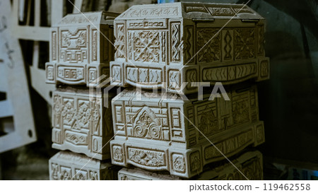 carving element. furniture in classic style. white color wood with gold trim. patina. carving. small depth of field. luxury furniture. use as background. 119462558
