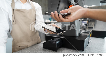 Contactless Mobile Payment at Modern Retail Store Counter with Customer and Cashier Contactless Mobile Payment at Modern Retail Store Counter with Customer and Cashier 119462786