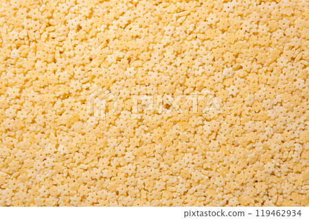Uncooked Stelline Pasta Background Uncooked Stelline Pasta Background 119462934