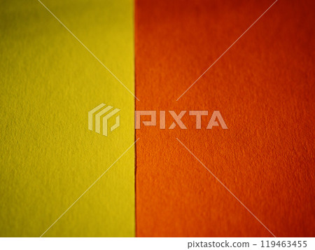 Orange leaf on yellow paper background. Sheets end to end. Side by side. Natural eco paper. Cardboard bright background with texture. Place for text. Copy space. Rovinj, Croatia - October 4, 2024 Orange leaf on yellow paper background. Sheets end to end. Side by side. Natural eco paper. Cardboard bright background with texture. Place for text. Copy space. Rovinj, Croatia - October 4, 2024 119463455