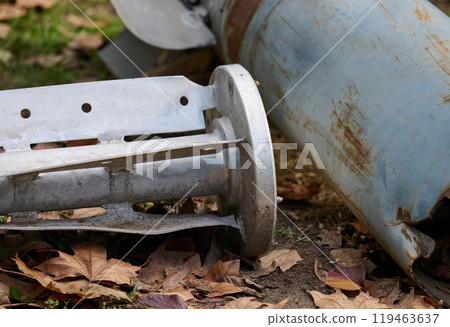 The tail section of a 220 mm rocket for the Uragan rocket fire system on a city flowerbed in Mykolaiv 119463637