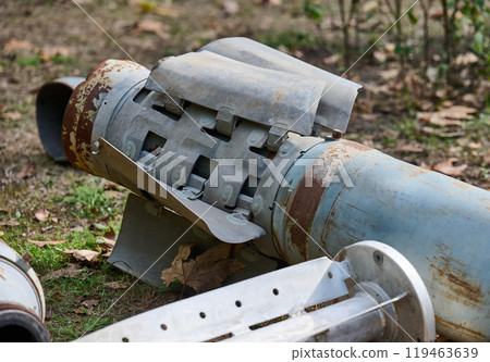 The tail section of a 220 mm rocket for the Uragan rocket fire system on a city flowerbed in Mykolaiv The tail section of a 220 mm rocket for the Uragan rocket fire system on a city flowerbed in Mykolaiv 119463639