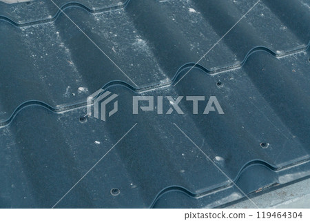 Textured Roof Tiles with Dust Particles in Natural Light 119464304