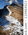 a snowy high mountain trail to the top 119464923