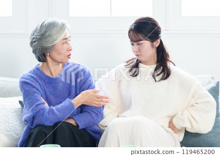 Grandmother and grandson fighting 119465200