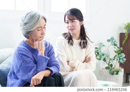 Grandmother and grandson fighting 119465206