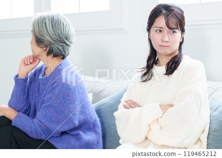 Grandmother and grandson fighting 119465212