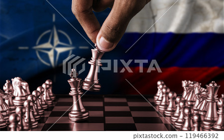 Political tension between Russia and NATO. Russia vs NATO flag on chessboard 119466392