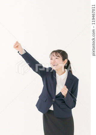 A woman in a suit with a guts pose A woman in a suit with a guts pose 119467011