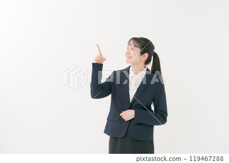 A woman in a suit making a recommended pose 119467288