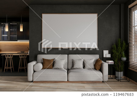 A contemporary living room near the kitchen features a couch, a picture frame on a dark grey wall. 119467683