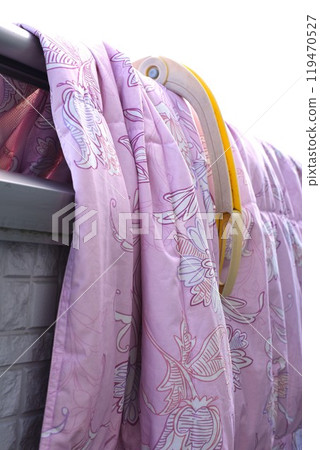 A blanket blown by the wind 119470527