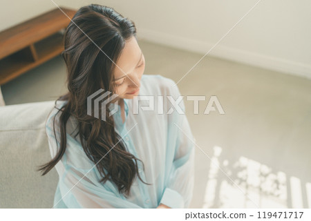 Young woman with long black hair Young woman with long black hair 119471717