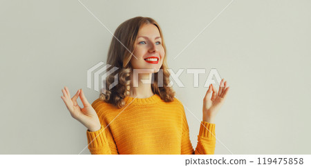 Calm relaxed healthy young woman meditates, girl practicing doing yoga exercises, stress relief Calm relaxed healthy young woman meditates, girl practicing doing yoga exercises, stress relief 119475858