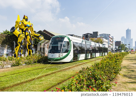 The circular light rail train drives past Pier-2 Art Center in Kaohsiung, Taiwan. 119476013