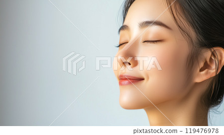 Dreamy profile of a woman with perfect glowing skin 119476978