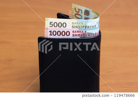 Albanian lek in the black wallet 119478666