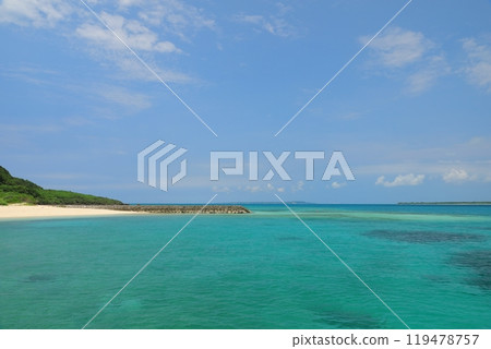 Beautiful white sand and blue sea at Kurima Fishing Port Beach 119478757