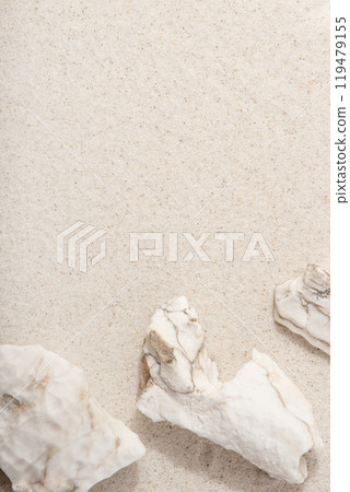Natural cosmetic background for product presentation. White rocks on the sand. Top view. 119479155