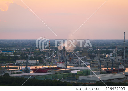 Wonderful view of industrial and port area of Ravenna at sunset Wonderful view of industrial and port area of Ravenna at sunset 119479605