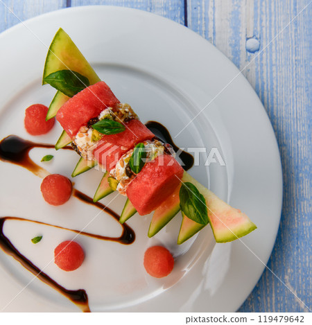 RECIPE OF SALAD OF FETA RINGS COATED WITH DRIED FRUIT, PISTACHE, NUTS AND PASTEQUE 119479642