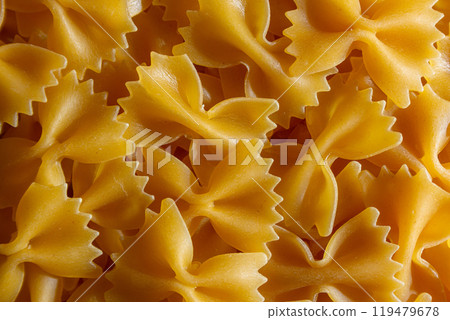 Uncooked Farfalle Pasta Background 119479678