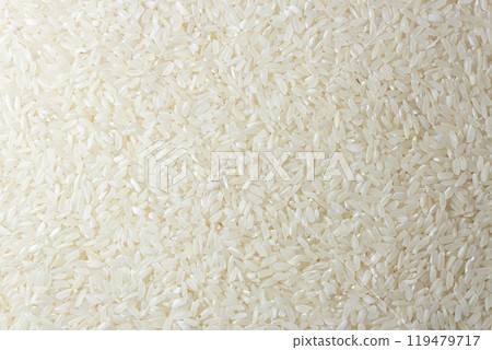 Dry Uncooked White Rice Background 119479717