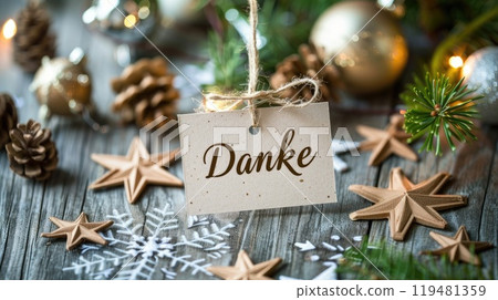 paper tag with german word thank you on christmas background 119481359