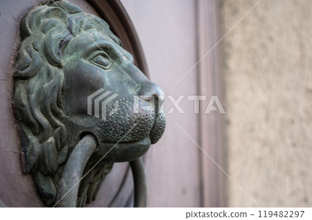 Budapest, Hungary. August 26, 2022. Lion head door knocker. 119482297