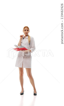 Doctor holding notebook and thinking, woman analyzing medical notes Doctor holding notebook and thinking, woman analyzing medical notes 119482926