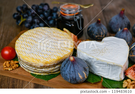 Selection of French cheeses from Normandy, AOP, Livarot, Neufchatel, Pont l'eveque, Rye bread, figs Selection of French cheeses from Normandy, AOP, Livarot, Neufchatel, Pont l'eveque, Rye bread, figs 119483610