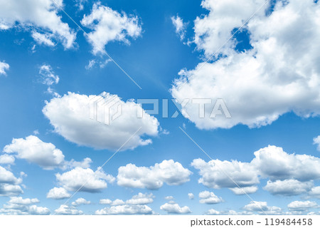 Beautiful blue sky and white cumulus clouds abstract background. Cloudscape background. Blue sky and fluffy white clouds on sunny days. Blue sky and daylight. World Ozone Day. Ozone layer. Summer sky. Beautiful blue sky and white cumulus clouds abstract background. Cloudscape background. Blue sky and fluffy white clouds on sunny days. Blue sky and daylight. World Ozone Day. Ozone layer. Summer sky. 119484458