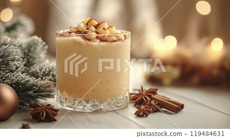 Christmas drink with cinnamon sticks and anise stars, glasse of sweet classic eggnog cocktail on Christmas, New Year decorated background with fir tree and baubles 119484631