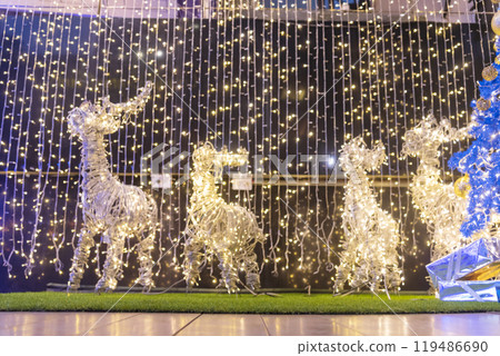 Blurred background golden glitter shiny sparkling banner. Happy Holidays background for template on christmas card brochures posters. Gold bokeh template for digital presentation slideshow background 119486690