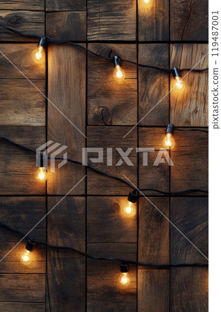 Warm string lights hanging against a rustic wooden wall create a cozy atmosphere at night Warm string lights hanging against a rustic wooden wall create a cozy atmosphere at night 119487001