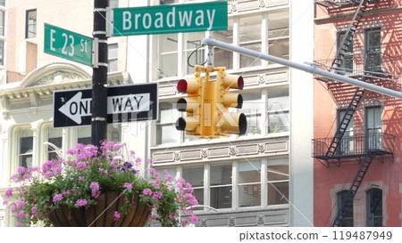 Broadway street road sign, Manhattan midtown architecture, New York City. Traffic signage of 23 st. 119487949