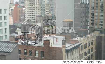 New York City Manhattan cityscape. Rooftop water towers, residential district buildings roof tanks. 119487952