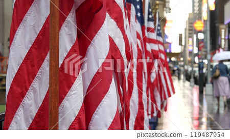 New York, american flags. Manhattan midtown city street patriotism. People, Broadway, Times Square. 119487954