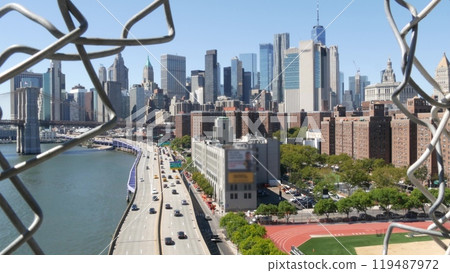Brooklyn Bridge from Manhattan Bridge. New York City downtown skyline, financial district cityscape. Brooklyn Bridge from Manhattan Bridge. New York City downtown skyline, financial district cityscape. 119487972