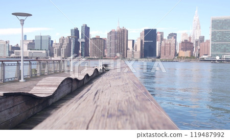 New York City waterfront skyline, Manhattan Midtown riverfront skyscrapers. Cityscape from Queens. 119487992